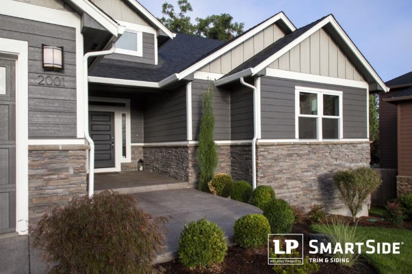 Modern house with gray exterior and white trim.