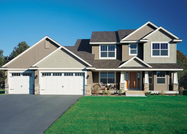 Modern two-story house with garage and lawn