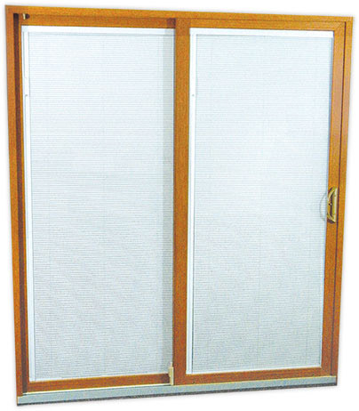 Sliding glass door with wooden frame.